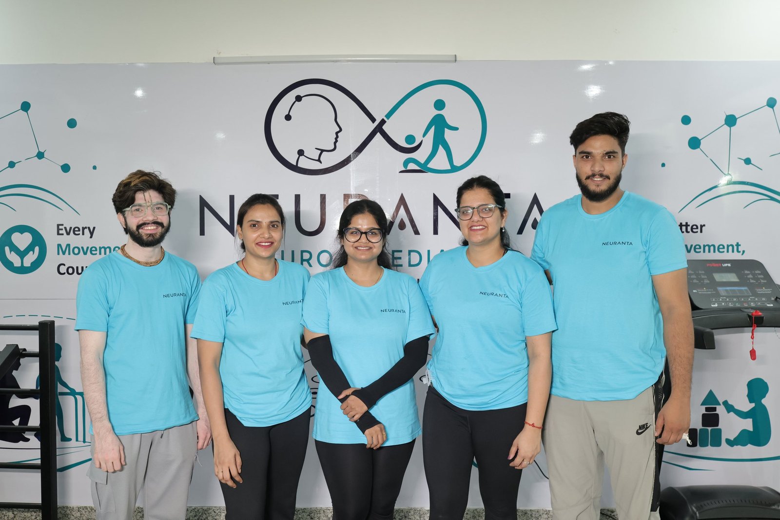 The Neuranta rehabilitation team at the Sector 39 Gurugram centre, standing together in front of the Neuranta branded wall